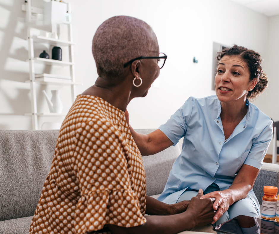 nurse meeting with elderly patient